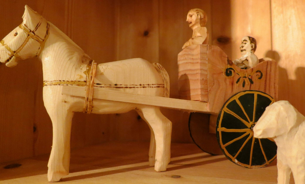 Spikket hest med kjerre